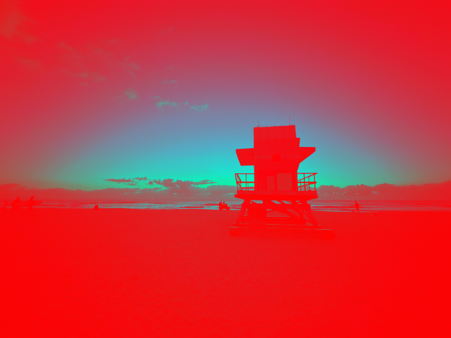 An image of the backside of lifeguard tower on the beach, facing the ocean, styleized with red overlay in foreground. There is blue and green sky and ocean in the distance.